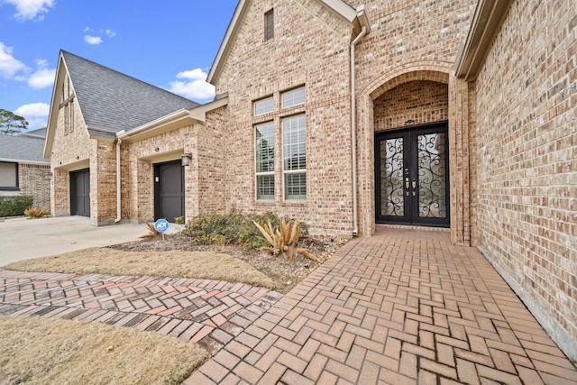 entrance to property featuring french doors