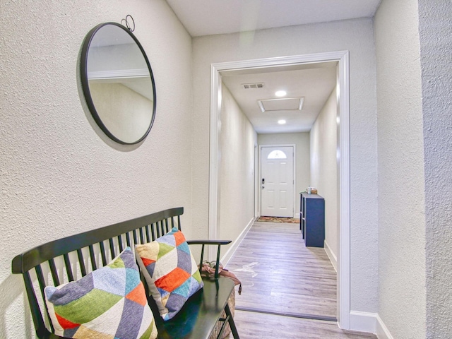 hallway featuring light wood-type flooring