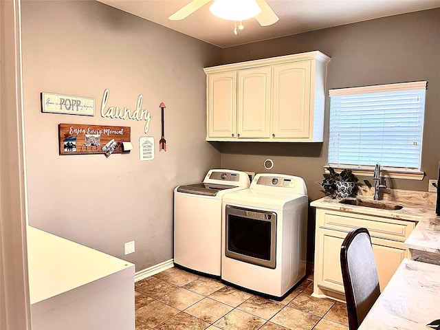 washroom with sink, ceiling fan, cabinets, washing machine and clothes dryer, and light tile patterned flooring