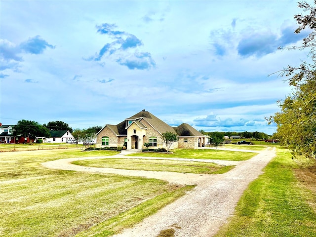 view of front facade featuring a front lawn