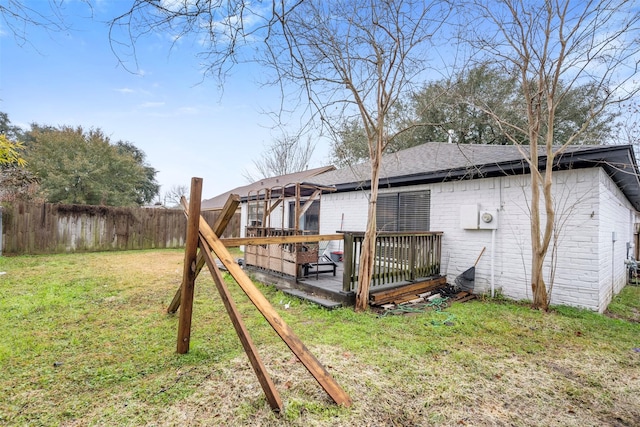 view of yard featuring a wooden deck