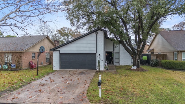 single story home with a garage and a front lawn