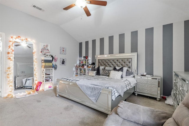 carpeted bedroom featuring vaulted ceiling and ceiling fan