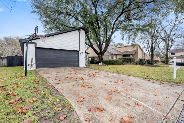 view of property exterior with a yard and a garage