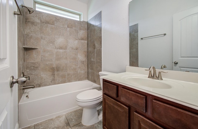 bathroom featuring toilet, tile patterned floors, shower / washtub combination, and vanity