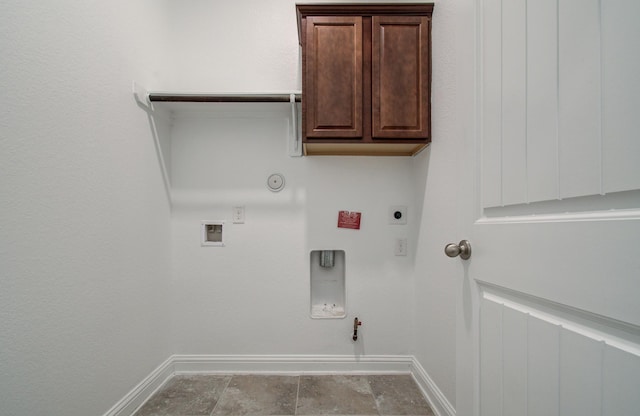 washroom featuring electric dryer hookup, baseboards, gas dryer hookup, and hookup for a washing machine