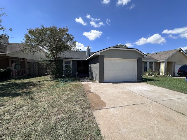 ranch-style home featuring brick siding, a chimney, concrete driveway, an attached garage, and a front lawn