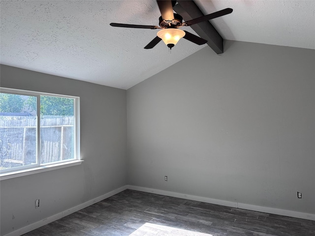 unfurnished room with ceiling fan, dark hardwood / wood-style flooring, a textured ceiling, and vaulted ceiling with beams