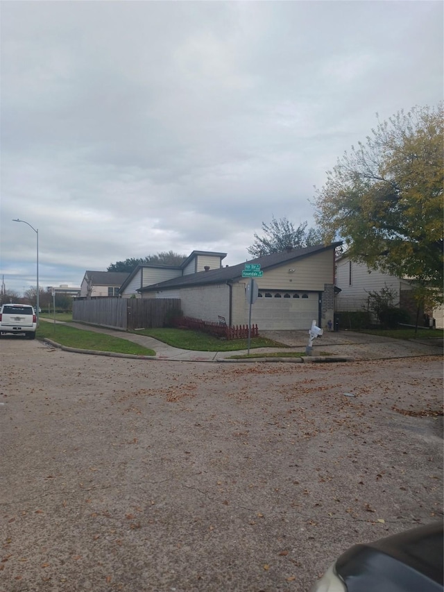 exterior space featuring a garage