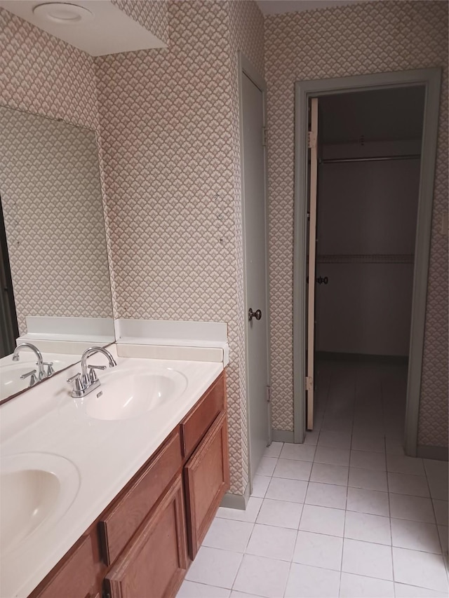 bathroom featuring vanity and tile patterned flooring