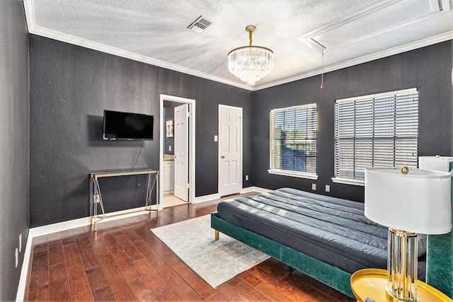 bedroom with crown molding, dark wood-type flooring, and a textured ceiling