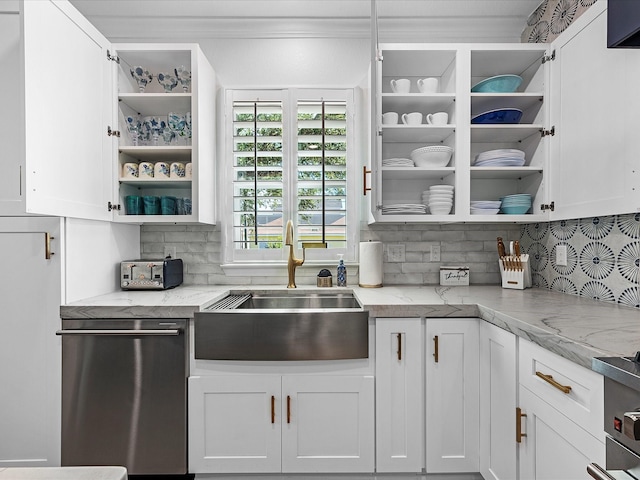 kitchen featuring tasteful backsplash, white cabinetry, sink, stainless steel dishwasher, and light stone counters