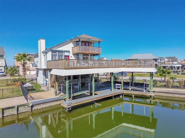 dock area with a water view