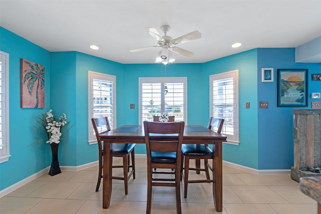 dining room featuring ceiling fan