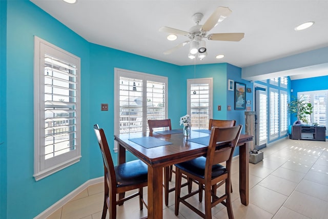 dining space featuring ceiling fan and plenty of natural light