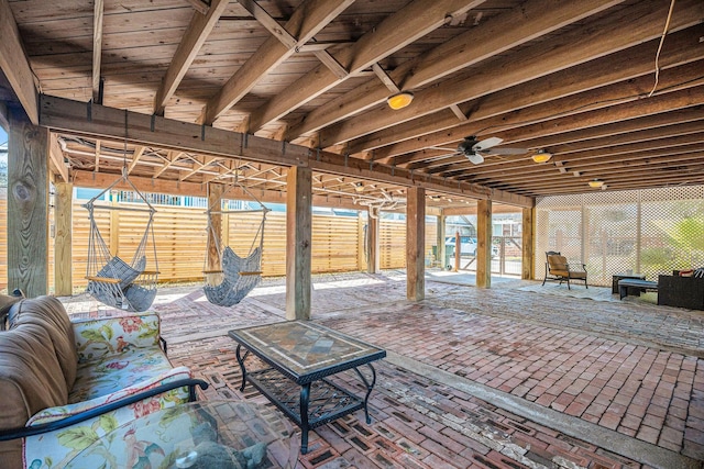 view of patio featuring ceiling fan