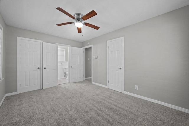 2817 John St, La Marque, TX 77568 - unfurnished bedroom with baseboards, a ceiling fan, carpet floors, and ensuite bathroom