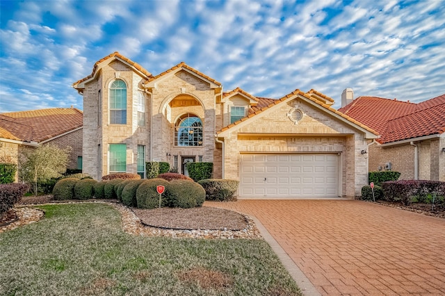 view of front of property with a garage