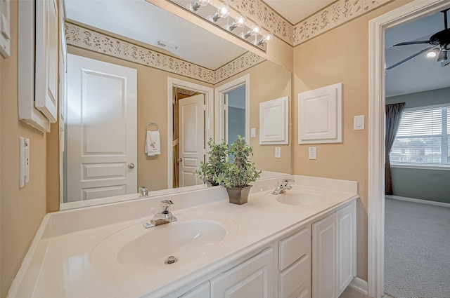 bathroom featuring vanity and ceiling fan