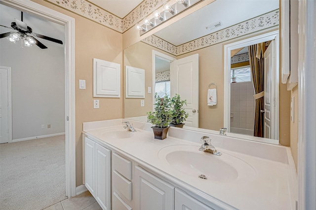 bathroom featuring vanity, tile patterned floors, and ceiling fan