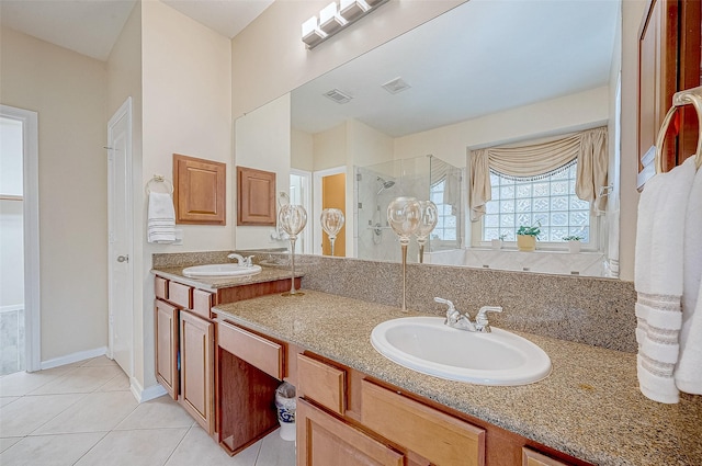 bathroom with vanity, tile patterned floors, and walk in shower