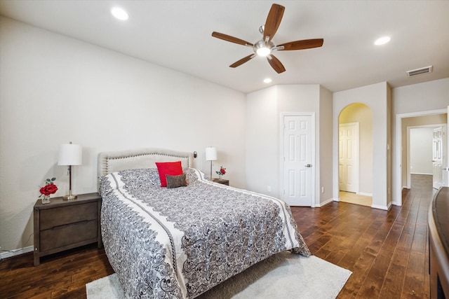 bedroom with dark wood-type flooring and ceiling fan