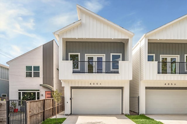 view of front of property with a balcony and a garage