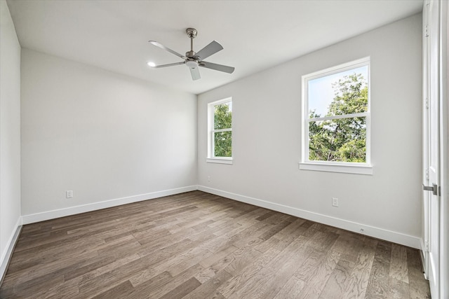 unfurnished room featuring ceiling fan and light hardwood / wood-style flooring