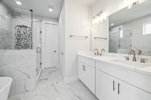 bathroom featuring vanity and plus walk in shower