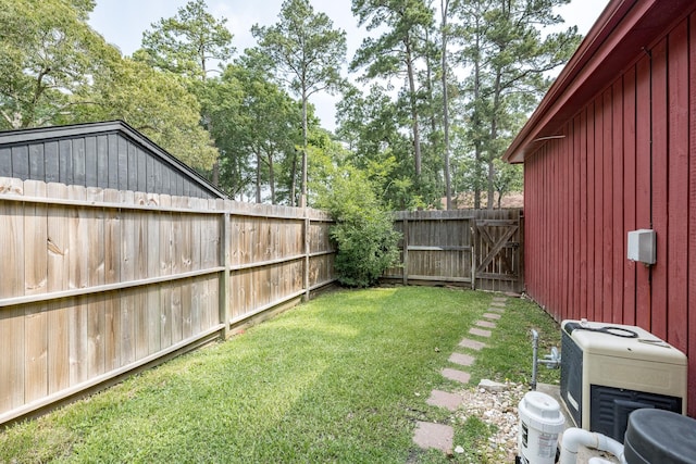 view of yard with central AC