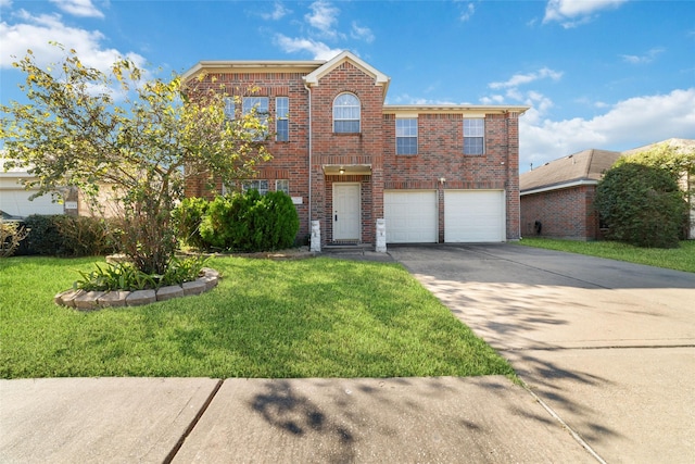 view of front property featuring a garage and a front yard