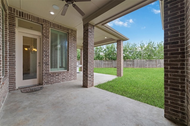 view of patio featuring ceiling fan