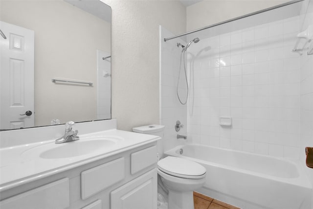 full bathroom with vanity,  shower combination, tile patterned floors, and toilet