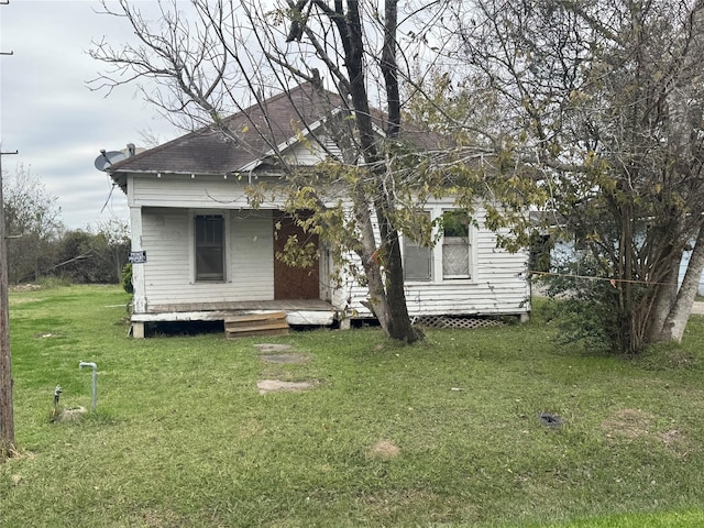 exterior space with a lawn