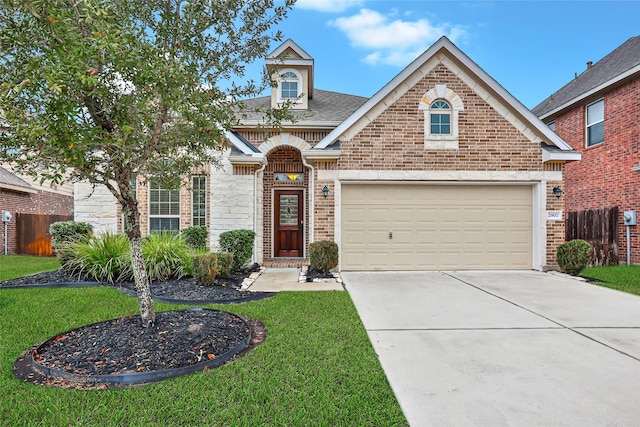 view of front of home with a front lawn