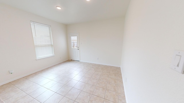 view of tiled spare room