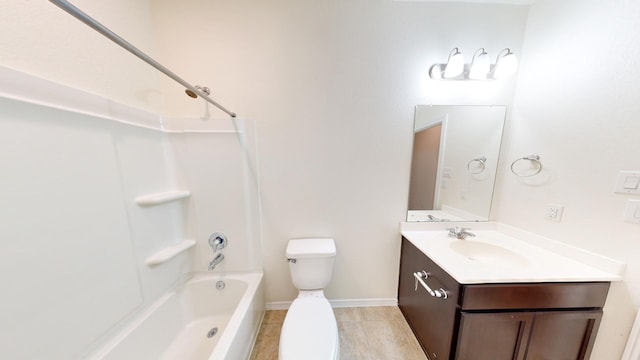 full bathroom featuring vanity, tub / shower combination, and toilet