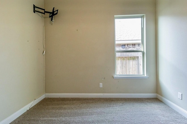 unfurnished room featuring carpet floors