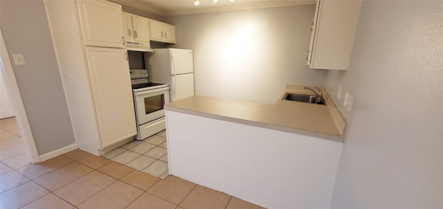 kitchen with sink, white appliances, light tile patterned floors, and white cabinets