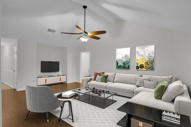 living room featuring hardwood / wood-style floors, lofted ceiling with beams, and ceiling fan