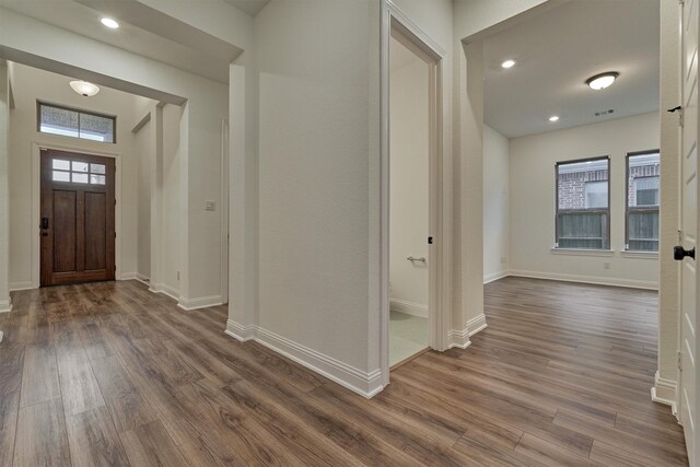 entrance foyer featuring dark hardwood / wood-style floors