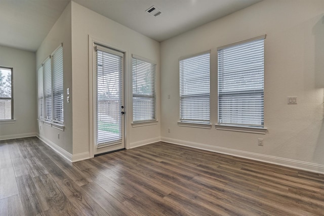 interior space with dark hardwood / wood-style flooring