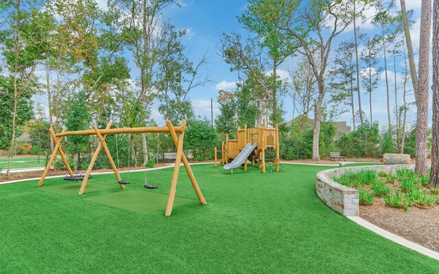 view of playground featuring a lawn