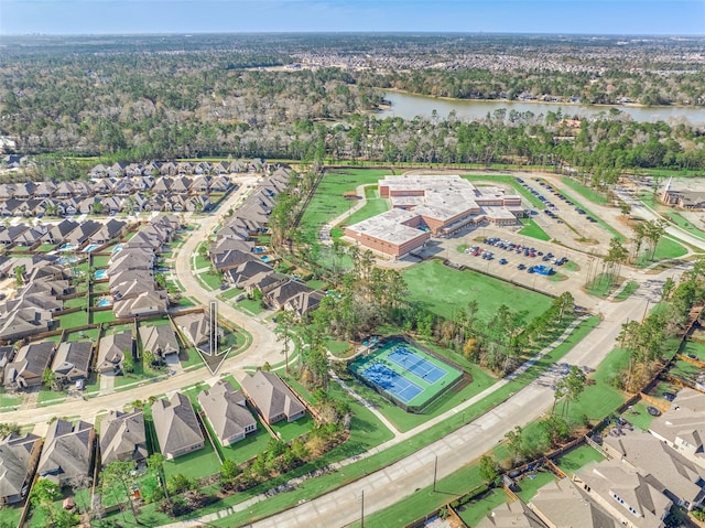 aerial view featuring a residential view and a water view