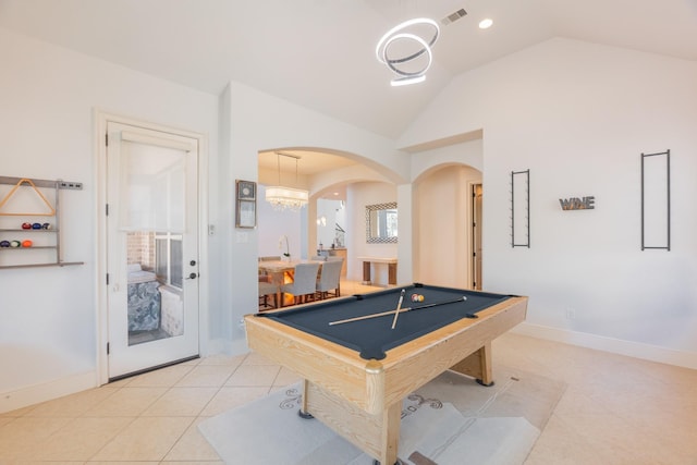 recreation room with vaulted ceiling, light tile patterned flooring, and pool table