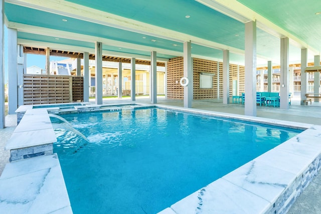 view of pool featuring a patio