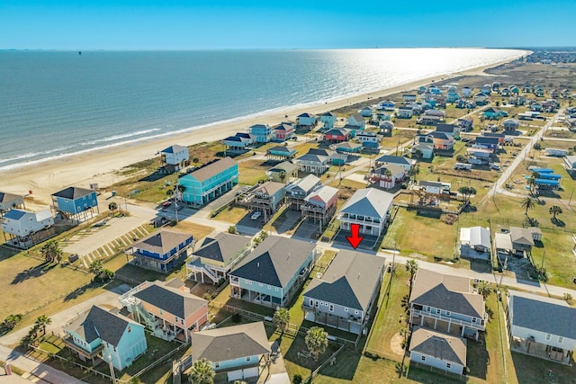 aerial view featuring a beach view and a water view