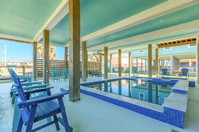 view of swimming pool featuring a patio