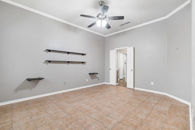 empty room featuring ceiling fan, ornamental molding, and light tile patterned floors