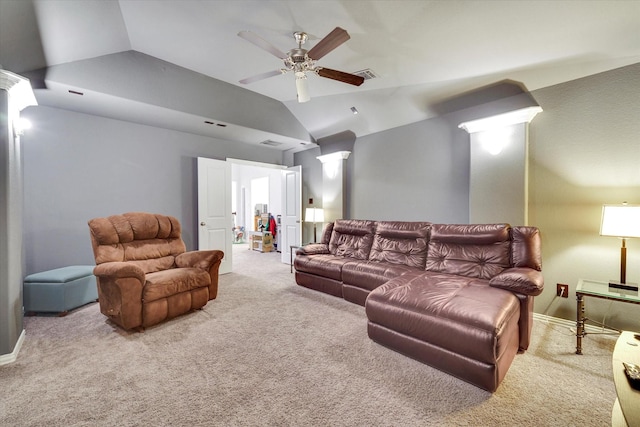 carpeted living room with ceiling fan, lofted ceiling, and ornate columns